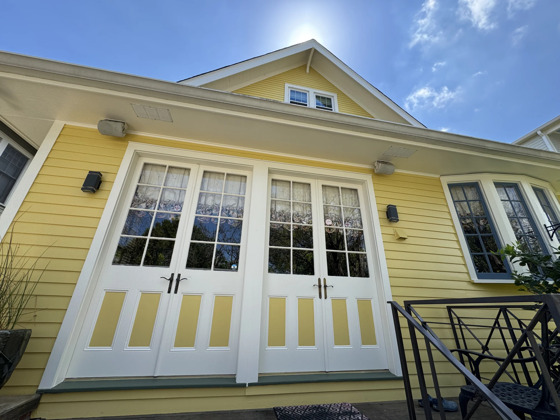 Close up showing exterior home preparation and scraping