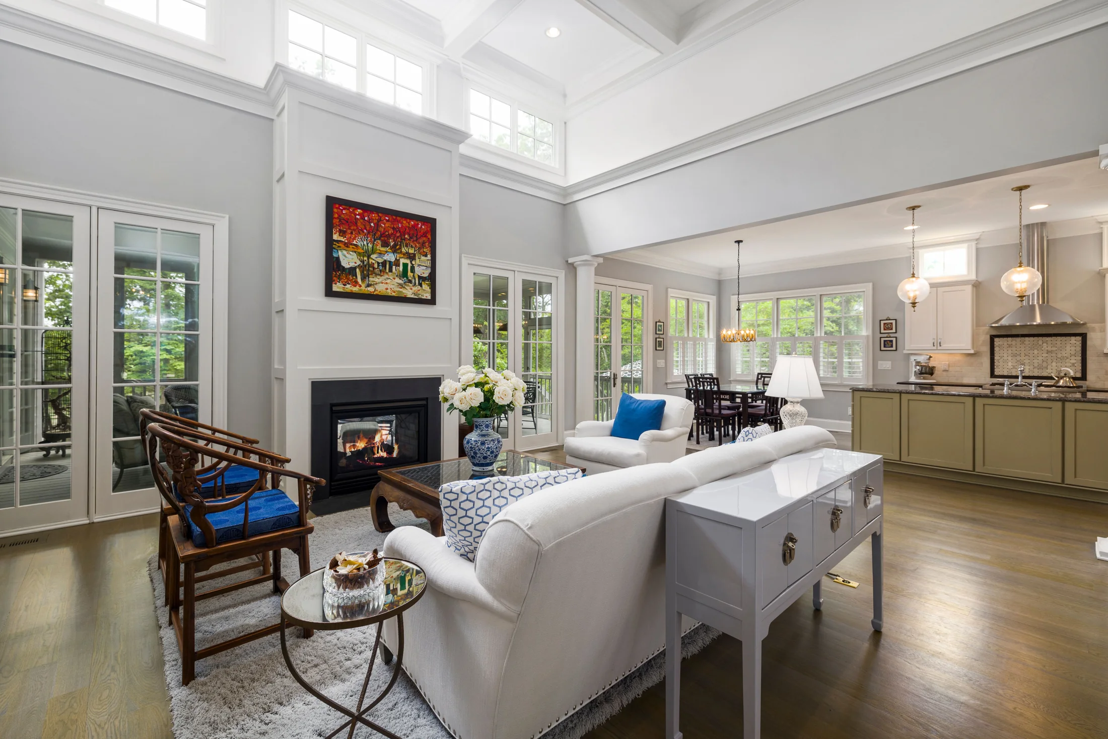 High-ceiling living room with freshly painted walls